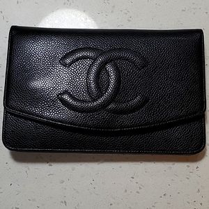 Chanel cross body clutch with many pockets, holds 6 credit cards, outside zipper